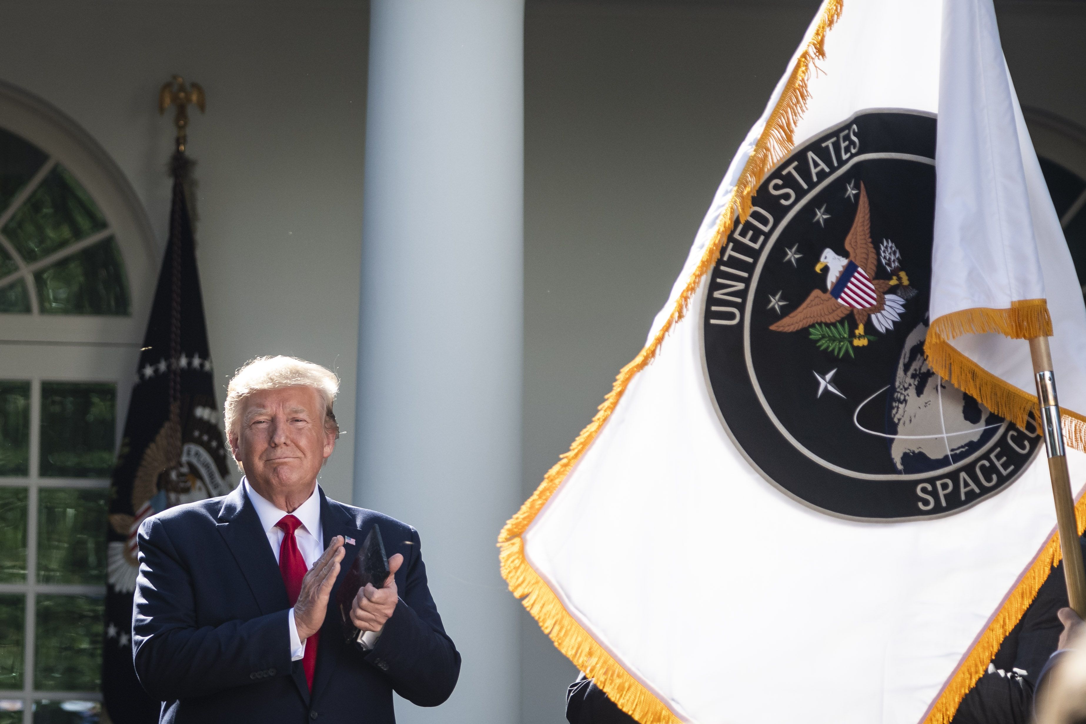 president-donald-j-trump-looks-as-a-flag-is-revealed-during-news-photo-1568822015.jpg